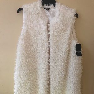 Woman’s faux fur sleeveless duster. Boho/ hippie